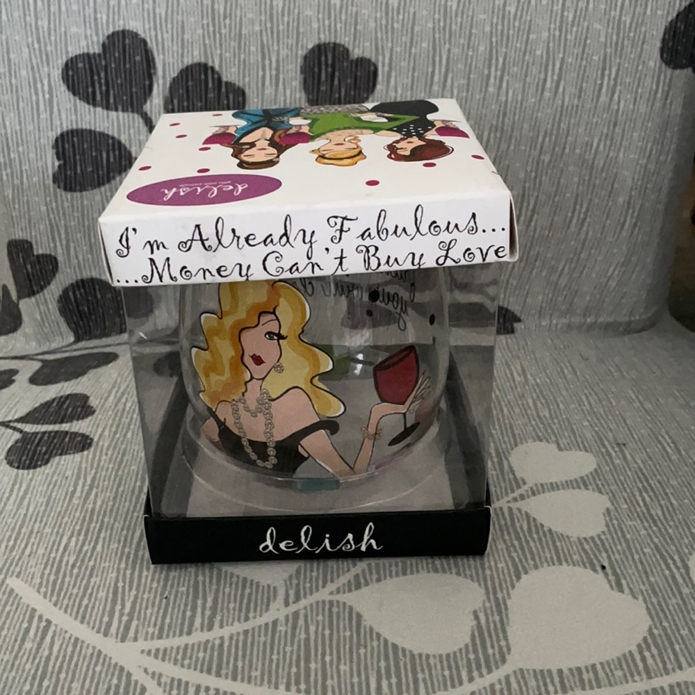 Wine glass by Delish. Saying Keep your friends close but your wine closer.
